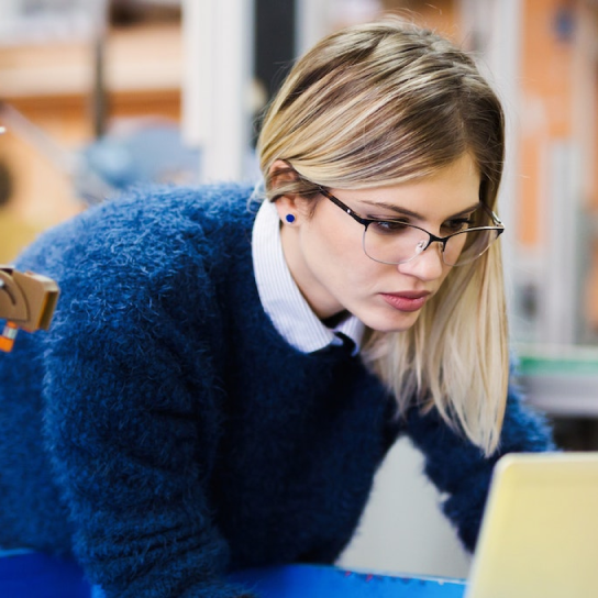 Learner looking on laptop