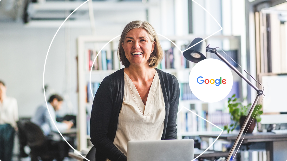 Woman smiling at her computer