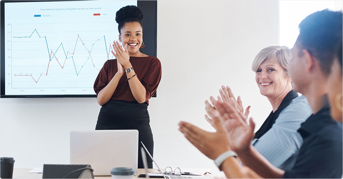 Employees celebrates during a presentation