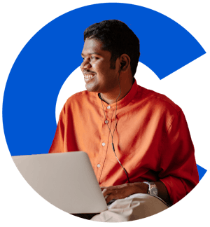 Smiling learner with laptop and earbuds in the Coursera logo C