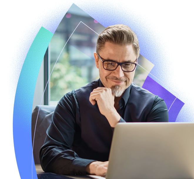 Man at desk with laptop