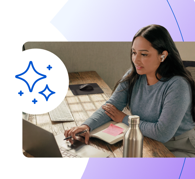 woman on laptop with earbuds