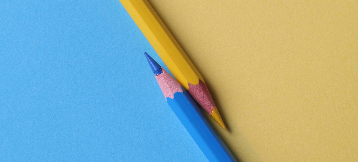 [Featured Image] Two pencils lay in opposite directions. One is yellow, and the other is blue.
