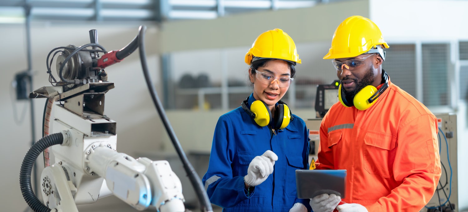 [Featured Image]:  Two industrial hygienists are discussing and checking the conditions of the workplace to see if there are hazards that have to be corrected. 