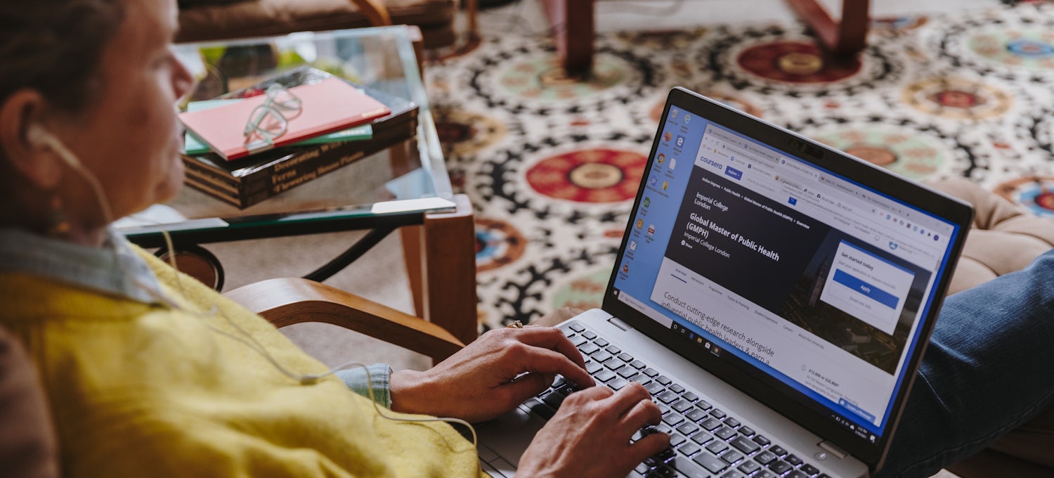 SEO specialist analyzing e-commerce website rankings on a laptop.