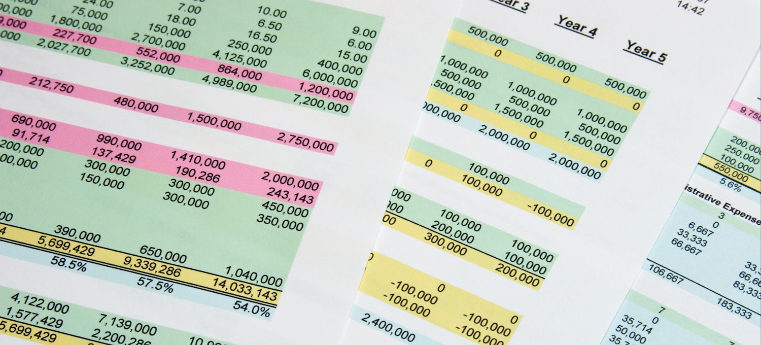 [Featured image] Papers with accounting tables in various highlighted colors