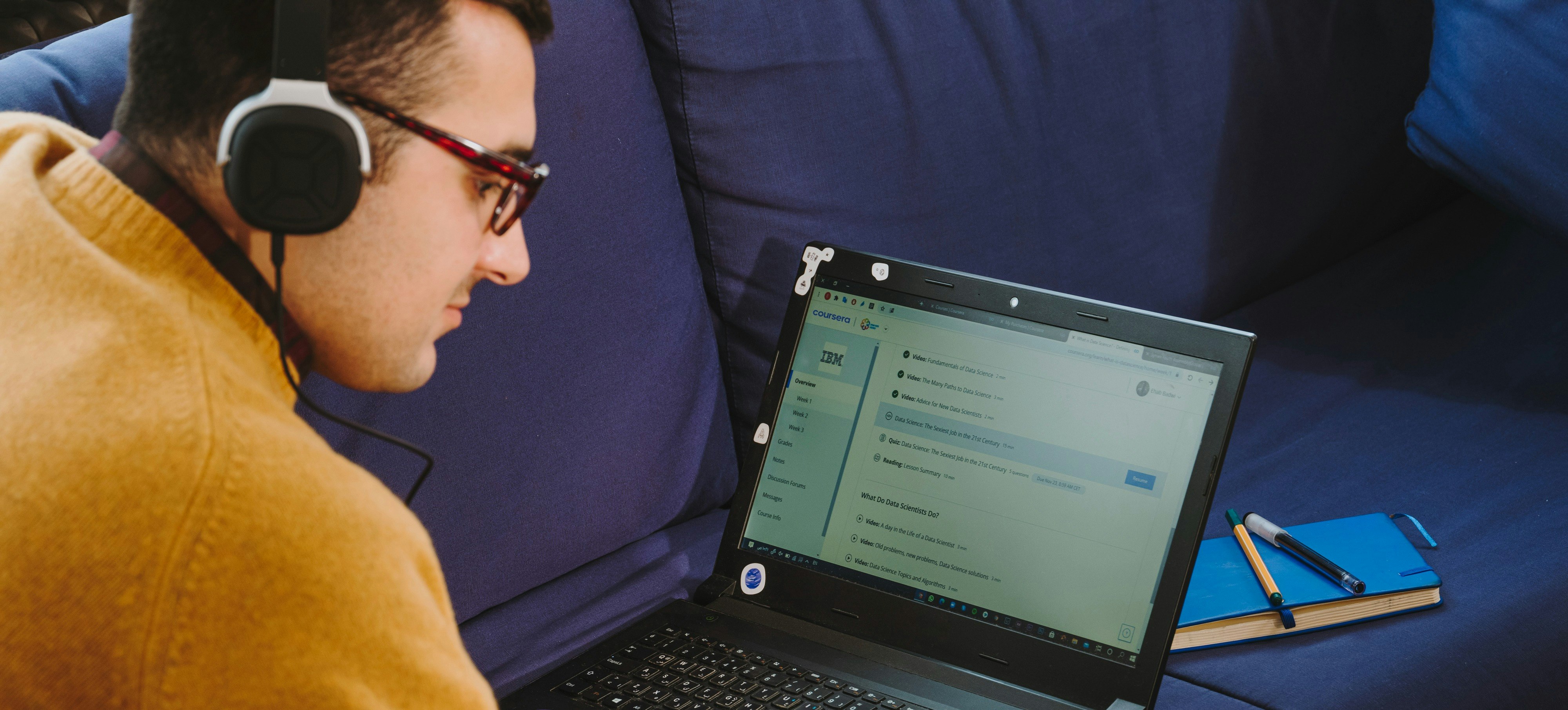 [Featured Image] A business intelligence analyst works with the Microsoft Power Bi tool.