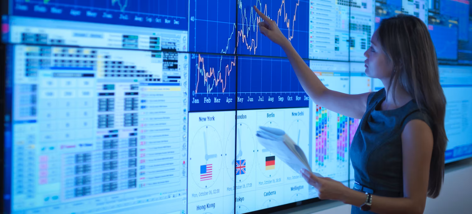 A student preparing a presentation on graphical screens.