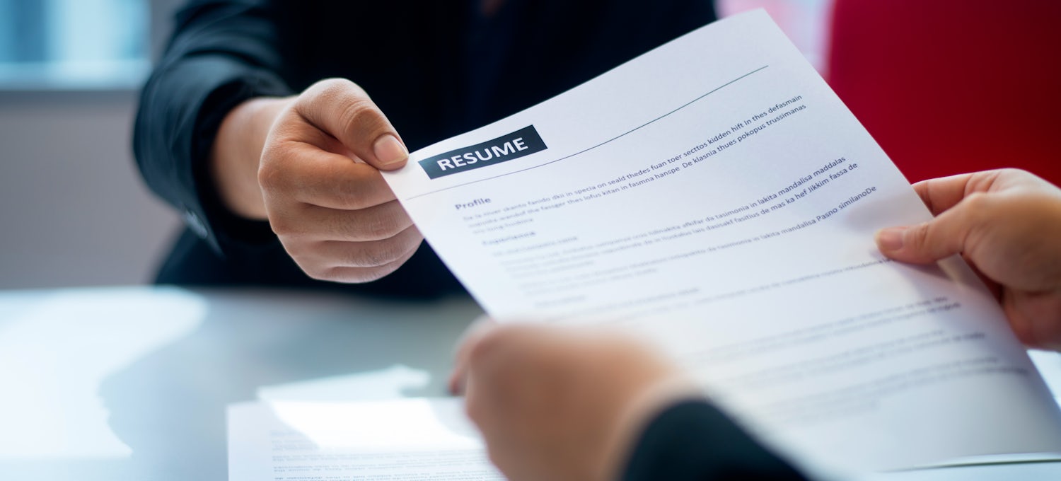 Executives Choosing Candidates Two Resume Papers Stock Photo