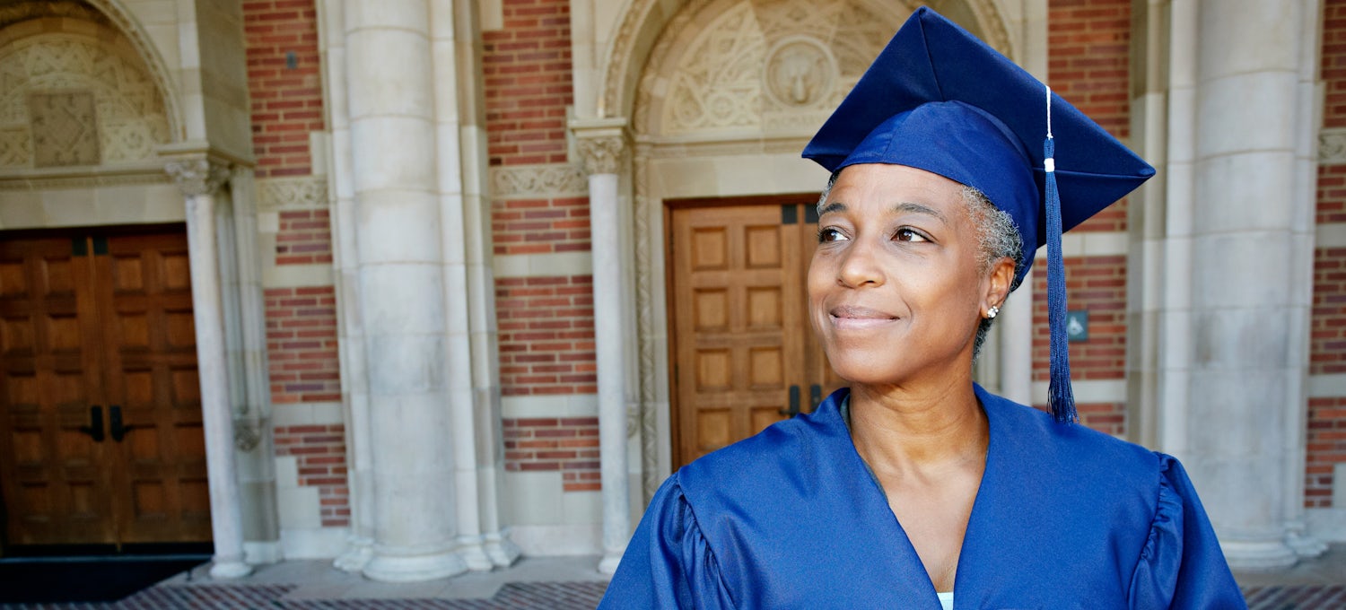 [Featured Image] A bachelor's degree graduate holds a diploma.